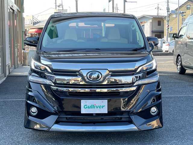 トヨタ ヴェルファイア ハイブリット V 埼玉県 2015(平27)年 13.2万km 黒 ・社外エアロ/・ワーク20インチアルミ/・純正ナビ　BT/TV/・後席モニター/・バック＆フロントカメラ/・ETC/・ドライブレコーダー/・電動パーキング/・両側パワースライドドア/・電動リアゲート/・ブレーキホールド/・ステアリングスイッチ/・レーダークルコン/・衝突軽減ブレーキ/・横滑り防止/・オットマン/・前席パワーシート/・シートメモリー/・純正フロアマット/・ドアバイザー/・ウッドコンビステアリング/・スマートキー×２/・プッシュスタート/・保証書/・取説