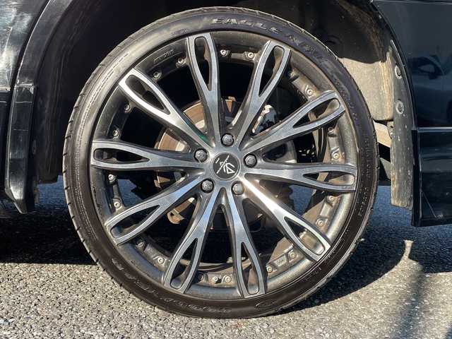 トヨタ ヴェルファイア ハイブリット V 埼玉県 2015(平27)年 13.2万km 黒 ・社外エアロ/・ワーク20インチアルミ/・純正ナビ　BT/TV/・後席モニター/・バック＆フロントカメラ/・ETC/・ドライブレコーダー/・電動パーキング/・両側パワースライドドア/・電動リアゲート/・ブレーキホールド/・ステアリングスイッチ/・レーダークルコン/・衝突軽減ブレーキ/・横滑り防止/・オットマン/・前席パワーシート/・シートメモリー/・純正フロアマット/・ドアバイザー/・ウッドコンビステアリング/・スマートキー×２/・プッシュスタート/・保証書/・取説