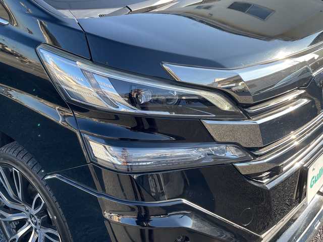 トヨタ ヴェルファイア ハイブリット V 埼玉県 2015(平27)年 13.2万km 黒 ・社外エアロ/・ワーク20インチアルミ/・純正ナビ　BT/TV/・後席モニター/・バック＆フロントカメラ/・ETC/・ドライブレコーダー/・電動パーキング/・両側パワースライドドア/・電動リアゲート/・ブレーキホールド/・ステアリングスイッチ/・レーダークルコン/・衝突軽減ブレーキ/・横滑り防止/・オットマン/・前席パワーシート/・シートメモリー/・純正フロアマット/・ドアバイザー/・ウッドコンビステアリング/・スマートキー×２/・プッシュスタート/・保証書/・取説