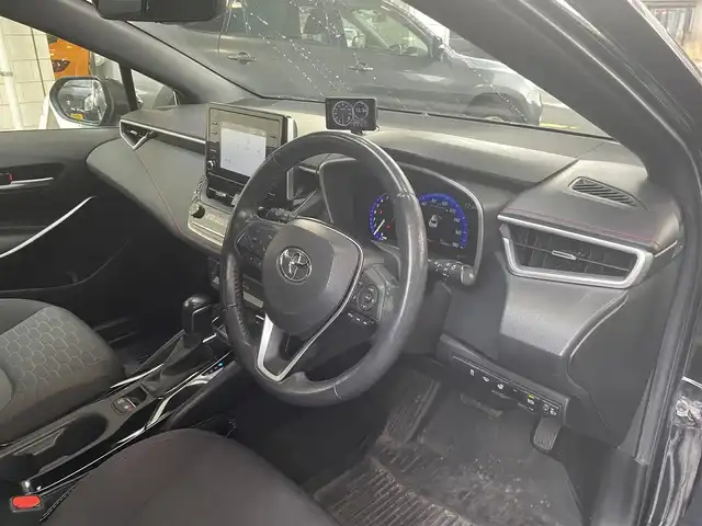 トヨタ カローラ スポーツ G Z 道央・札幌 2020(令2)年 12.3万km アティチュードブラックマイカ 純正ディスプレイオーディオ（AM/FM/USB/BT/フルセグTV/CD/DVD）/バックカメラ/ドライブレコーダー前後/シートヒーター/オートエアコン/オートブレーキホールド/電動パーキングブレーキ/パドルシフト/衝突軽減ブレーキ/レーンアシスト/クルーズコントロール/横滑り防止装置/オートマチックハイビーム/ステアリングヒーター/レーダー探知機/ＳＯＳスイッチ/純正エンジンスターター/アイドリングストップ/積み込み夏タイヤ（AW付）/電動格納ミラー/純正ドアバイザー/純正フロアマット/プッシュスタート/ETC/取説、保証書有/スペアキー×1