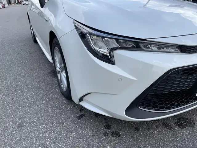 トヨタ カローラツーリング ハイブリッド S 石川県 2020(令2)年 9.8万km ホワイトパールクリスタルシャイン 4WD/トヨタセーフティセンス/純正ディスプレイオーディオ/ナビ/バックカメラ/LEDヘッドライト/ETC/ドライブレコーダー/レーダークルーズ/純正アルミホイール/スマートキー/プッシュスタート