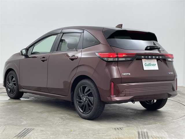 日産 ノート X 90周年記念車 岡山県 2024(令6)年 0.3万km バーガンディー 純正9インチメモリナビゲーション/【BT/USB/HDMI/フルセグTV】/プロパイロット/衝突軽減ブレーキ/アラウンドビューモニター/ビルトインETC2.0/LEDヘッドライト/デジタルインナーミラー/純正ドライブレコーダー/純正16インチアルミ/純正フロアマット/ステアリングスイッチ/アイドリングストップ/チルトステアリング/ウィンカーミラー/シートリフター/純正ドアバイザー/横滑り防止機能/プッシュスタート/スマートキー×2/禁煙車/取扱説明書/ナビ取扱説明書