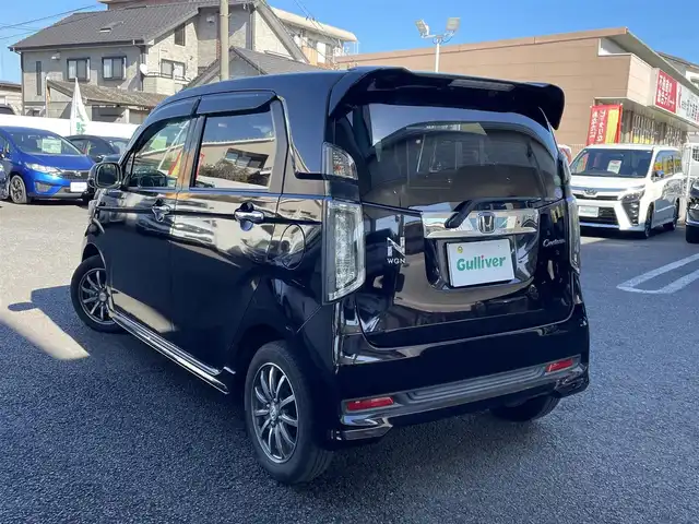 ホンダ Ｎ ＷＧＮ カスタム G ターボパッケージ 大分県 2015(平27)年 13.9万km プレミアムゴールドパープルパール ・ワンオーナー/・社外ナビ　CN-R300D/　ワンセグテレビ/　DVD/CD/　Bluetooth/　SD/　ラジオ/　AUX/・ETC/・横滑り制御システム/・ヒルスタートアシスト機能/・アイドリングストップ/・エマージェンシーストップシグナル/・クルーズコントロール/・ステアリングスイッチ/・パドルシフト/・チルトステアリング/・革巻きステアリング/・ウィンカーミラー/・プライバシーガラス/・純正フロアマット/・純正14インチアルミホイル/・ドアバイザー/・スペアキー１本/・保証書/・オーナーズマニュアル