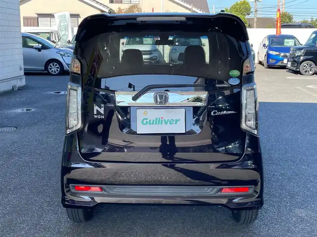 ホンダ Ｎ ＷＧＮ カスタム G ターボパッケージ 大分県 2015(平27)年 13.9万km プレミアムゴールドパープルパール ・ワンオーナー/・社外ナビ　CN-R300D/　ワンセグテレビ/　DVD/CD/　Bluetooth/　SD/　ラジオ/　AUX/・ETC/・横滑り制御システム/・ヒルスタートアシスト機能/・アイドリングストップ/・エマージェンシーストップシグナル/・クルーズコントロール/・ステアリングスイッチ/・パドルシフト/・チルトステアリング/・革巻きステアリング/・ウィンカーミラー/・プライバシーガラス/・純正フロアマット/・純正14インチアルミホイル/・ドアバイザー/・スペアキー１本/・保証書/・オーナーズマニュアル