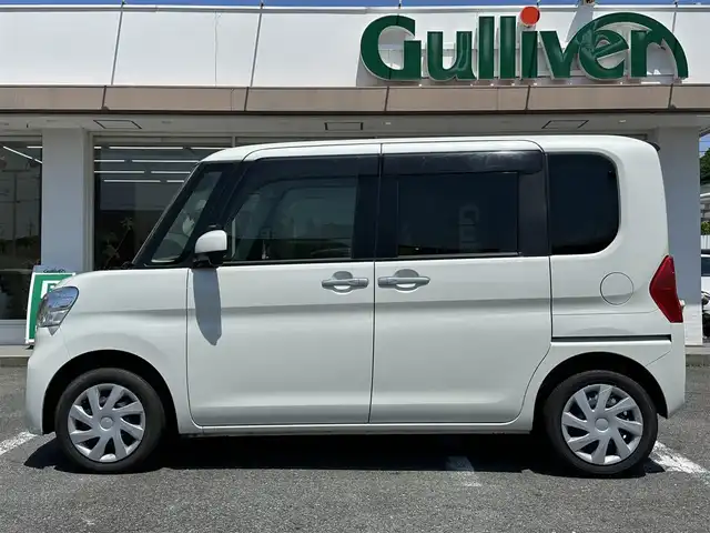 ダイハツ タント L SAⅡ 三重県 2015(平27)年 1.4万km パールホワイトⅢ ♪走行13178キロ/♪車検８年１２月１３日/♪スマートアシスト/・衝突警報機能（対車両・対歩行者）/・衝突回避支援ブレーキ機能/・誤発進抑制制御機能/・後方誤発進抑制制御機能/・先行車発進お知らせ機能/・車線逸脱警報機能/♪ecoIDLE/社外メモリーナビ/・DVD再生/・Bluetooth/・CD録音/・SD/・フルセグ/バックカメラ/ステアリングスイッチ/ヘッドライトレベライザー/リアドアサンシェード/ベンチシート/プライバシーガラス/ドアバイザー/フロアマット/電動格納ミラー