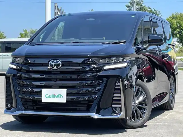 トヨタ ヴェルファイア ハイブリット Z プレミア 道央・札幌 2024(令6)年 0.5万km ブラック ４ＷＤ/ワンオーナー/ガラスルーフ/１４インチディスプレイオーディオ/Ｂｌｕｅｔｏｏｔｈ／Ｍｉｒａｃａｓｔ/バックカメラ/フリップダウンモニター/パノラミックビューモニター/デジタルインナーミラー/コンビステアリング/ステアリングヒーター/電動ステアリングチルト/レザーシート/全席パワーシート/運転席シートメモリ/全席シートヒーター／エアシート/２列目オットマン/純正カーテン/サイドシェード/ユニバーサルステップ/プリクラッシュセーフティ/パーキングサポートブレーキ/レーンディパーチャーアラート/リアカメラディクション/ブラインドスポットモニタリング/プロアクティブドライビングアシスト/リアクロストラフィックアラート/ドライバーモニター/ヘッドアップディスプレイ/ロードサインアシスト/オートライト／オートハイビームアシスト/ＬＥＤ/フォグランプ／リアフォグランプ/シーケンシャルウィンカー/レインセンサー/両側パワースライドドア/ＡＣ１００Ｖ/パワーバックドア/オート電動格納ミラー/自動駐車支援システム