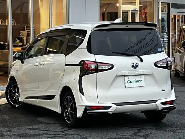 トヨタ シエンタ ハイブリッド G クエロ 山口県 2019(令1)年 7.5万km ホワイトパールクリスタルシャイン モデリスタアンダーエアロ/純正9型メモリーナビ＆フルセグTV/パノラミックビューカメラ/純正フロアマット/純正ドアバイザー/社外15インチアルミ/両側パワースライドドア/クルーズコントロール/オートライト/オートハイビーム/ステアリングヒーター/フロントシートヒーター/ビルトインETC2.0