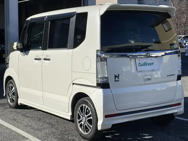 ホンダ Ｎ ＢＯＸ カスタム G SSパッケージ 千葉県 2013(平25)年 5.9万km プレミアムホワイトパール 純正ナビ（VXM-142VFi）/FM.AM / CD.DVD / BT / SD / ワンセグTV/プッシュスタート/スマートキー/バックカメラ/両側パワースライドドア/ステアリングリモコン/ドライブレコーダー/ETC/電格ミラー/ウィンカーミラー/オートライト/HIDヘッドライト/フォグランプ/フロアマット/ドアバイザー/スペアキー/保証書/取扱説明書
