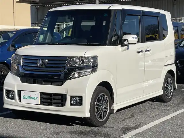 ホンダ Ｎ ＢＯＸ カスタム G SSパッケージ 千葉県 2013(平25)年 5.9万km プレミアムホワイトパール 純正ナビ（VXM-142VFi）/FM.AM / CD.DVD / BT / SD / ワンセグTV/プッシュスタート/スマートキー/バックカメラ/両側パワースライドドア/ステアリングリモコン/ドライブレコーダー/ETC/電格ミラー/ウィンカーミラー/オートライト/HIDヘッドライト/フォグランプ/フロアマット/ドアバイザー/スペアキー/保証書/取扱説明書