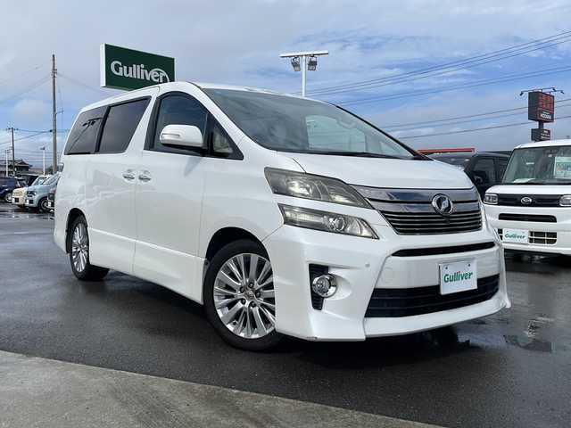 トヨタ ヴェルファイア 3．5Z Gエディション 徳島県 2013(平25)年 15.4万km ホワイトパールクリスタルシャイン 純正ナビ/（ラジオ/DISC/USB/フルセグ/BT/VTR/HDD）/全方位カメラ/純正18インチアルミホイール/D/N席パワーシート/D/N席シートヒーター/シートメモリ/ツインサンルーフ/クリアランスソナー/フリップダウン/純正フロアマット/オットマン/ビルトインETC/クルーズコントロール/両側電動スライドドア/スペアキー/電動格納ミラー/ECO MODE/nanoe/新車時保証書/取扱説明書