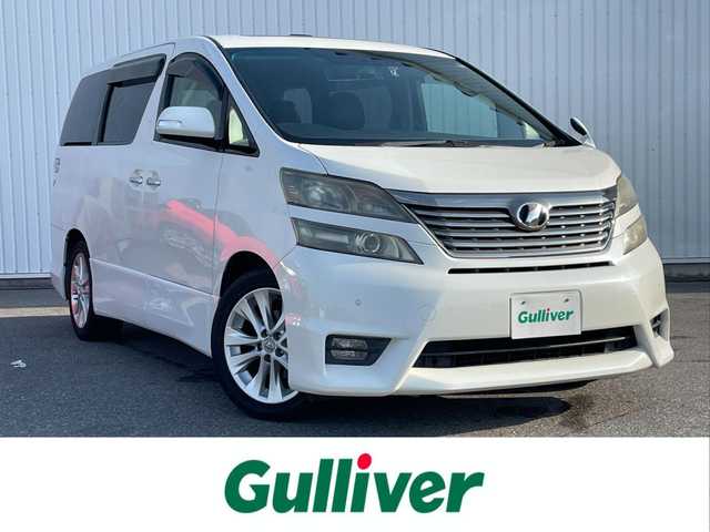 トヨタ ヴェルファイア 3．5Z プラチナセレクション 滋賀県 2010(平22)年 5万km ホワイトパールクリスタルシャイン サンルーフ/純正HDDナビ/(フルセグTV CD DVD Bluetooth)/バックカメラ/ALPINE製リヤモニター/両側パワースライドドア/クルーズコントロール/ウッドコンビステアリング/ステアリングリモコン/プッシュスタート/スマートキー×２/ドライブレコーダー/ETC/電動格納ミラー/ウインカーミラー/ドアバイザー/純正フロアマット
