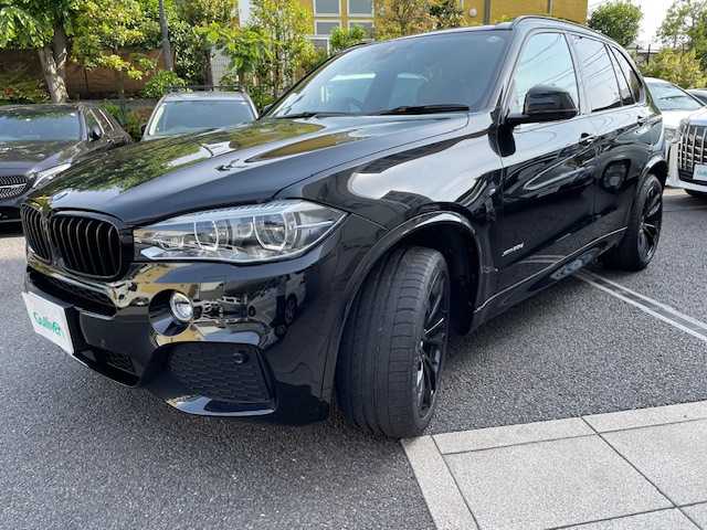 ＢＭＷ Ｘ５ リミテッドブラック 東京都 2018(平30)年 4.3万km サファイアブラックP 110台特別限定車両（シリアル047/110）/インテリジェントセーフティ（詳細は検査員記入欄参照）・アクティブクルーズコントロール/パノラマサンルーフ/アダプティブMサスペンション/ダウンヒルアシストコントロール/ワンオーナー/保証書・取説・Egプッシュスタート/スマートキー×２/革巻きステア・パドルシフト・電動チルト・ステアスイッチ/アイドリングストップ/ドライブモードセレクト/黒レザーシート・前席スポーツシート＆パワーシート/全席シートヒーター/純正HDDナビ・フルセグTV/DVD/CD/AUX/USB/BT/AppleCarPlay/Androidauto/ハーマン/カードン サラウンドサウンドシステム（16スピーカー）/360°ビューカメラ・パークトロニック・パーキングアシスト/ルームミラー型ETC/外前後ドラレコ（セルスター）/純正２０インチアルミ/アダプティブLEDヘッドライト・オートライト・前後フォグ/パワーバックドア/ブラックルーフレール/ソフトクローズドア/AUTOHOLD/トノカバー/H31/R2.3.4.5年度ディーラー記録簿