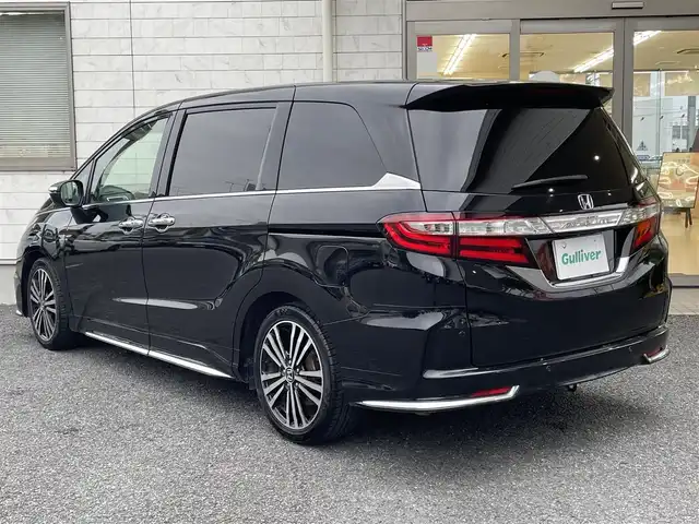 ホンダ オデッセイ アブソルート・EXホンダセンジング 埼玉県 2018(平30)年 6.7万km クリスタルブラックパール コーナーセンサー/パワーシート/メーカーオプションメモリーナビ（AM/FM/DISC/USB/i-pod/Bluetooth/フルセグTV）/両側パワースライドドア/クルーズコントロール（追従）/レーンアシスト/トラクションコントロールシステム/衝突軽減ブレーキ/アイドリングストップ/フリップダウンモニター/パーキングセンサー/パドルシフト/オートライト/パーキングアシスト/電動格納ミラー/ビルドインETC/ドライブレコーダー/純正フロアマット/プッシュスタート/オットマン