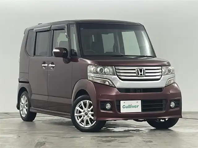 ホンダ Ｎ ＢＯＸ カスタム G Lパッケージ 福島県 2013(平25)年 6.2万km プレミアムディープロッソパール 衝突被害軽減システム/純正ナビ/【AM/FM/DVD/CD/Bluetooth/ワンセグ】/型番:VXM-128VS/バックカメラ　/ＥＴＣ　/パワースライドドア　/プッシュスタート　/・スマートキー/ＬＥＤヘッドライト　/・フォグランプ　/片側パワースライドドア/ステアリングスイッチ/・革巻きステアリング/・チルトステアリング/チップアップシート/LEDライト/・オートライト　/・フォグライト/ウィンカーミラー/純正フロアマット/アイドリングストップ