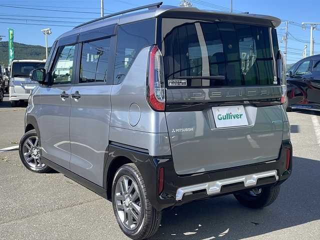 三菱 デリカミニ T プレミアム 道東・釧路十勝 2024(令6)年 2.4万km グレーＭⅡ ・４WD/・純正7インチSDメモリナビ/（CD・DVD・BT・AM・FM・フルセグ）/・マルチアラウンドビューモニター/・両側パワースライドドア/・アイドリングストップ/・本革ステアリング/・e-Assist/・MI-PILOT/・パドルシフト/・ステアリングヒーター/・ハーフレザーシート/・前席シートヒーター/・純正15インチアルミホイール/・LEDヘッドライト/・ルーフレール/・スマートキー/・ETC/・社外ドライブレコーダー/・社外フロアマット/・ドアバイザー/・保証書/・取扱説明書