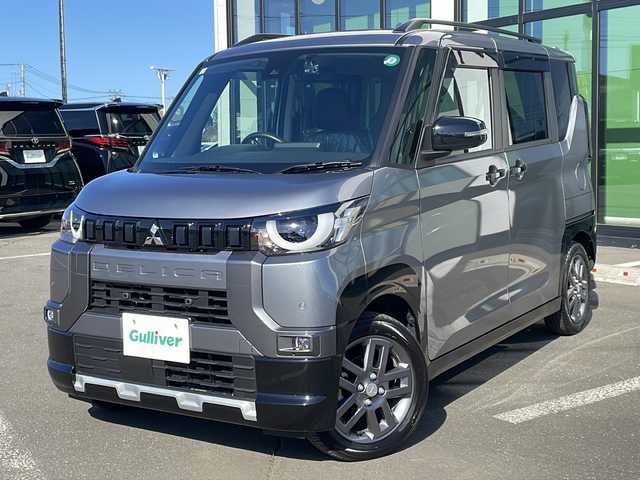 三菱 デリカミニ T プレミアム 道東・釧路十勝 2024(令6)年 2.4万km グレーＭⅡ ・４WD/・純正7インチSDメモリナビ/（CD・DVD・BT・AM・FM・フルセグ）/・マルチアラウンドビューモニター/・両側パワースライドドア/・アイドリングストップ/・本革ステアリング/・e-Assist/・MI-PILOT/・パドルシフト/・ステアリングヒーター/・ハーフレザーシート/・前席シートヒーター/・純正15インチアルミホイール/・LEDヘッドライト/・ルーフレール/・スマートキー/・ETC/・社外ドライブレコーダー/・社外フロアマット/・ドアバイザー/・保証書/・取扱説明書