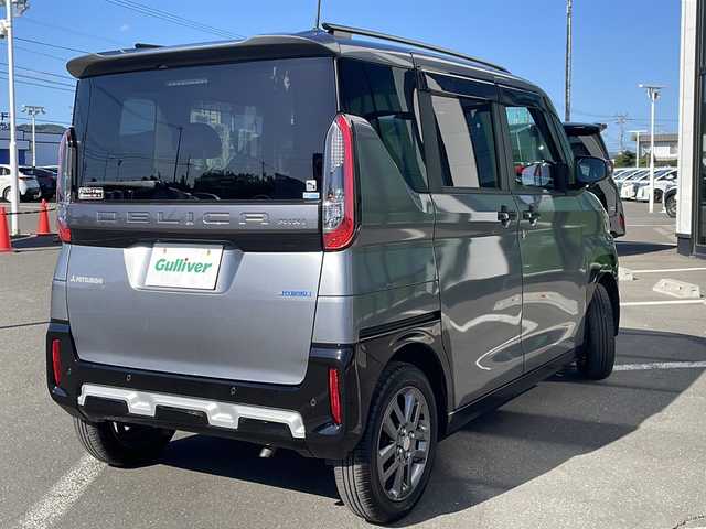 三菱 デリカミニ T プレミアム 道東・釧路十勝 2024(令6)年 2.4万km グレーＭⅡ ・４WD/・純正7インチSDメモリナビ/（CD・DVD・BT・AM・FM・フルセグ）/・マルチアラウンドビューモニター/・両側パワースライドドア/・アイドリングストップ/・本革ステアリング/・e-Assist/・MI-PILOT/・パドルシフト/・ステアリングヒーター/・ハーフレザーシート/・前席シートヒーター/・純正15インチアルミホイール/・LEDヘッドライト/・ルーフレール/・スマートキー/・ETC/・社外ドライブレコーダー/・社外フロアマット/・ドアバイザー/・保証書/・取扱説明書