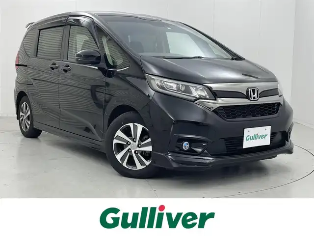 ホンダ フリード G ホンダセンシング 茨城県 2020(令2)年 7.7万km クリスタルブラックパール 純正ナビ/Bluetooth/フルセグ/radio/CD/DVD/バックカメラ/Honda SENSING/モデューロエアロ/レーダークルーズコントロール/Sパッケージ/・コンビシート/・本革巻ステアリングホイール/前後ドラレコ/前席シートヒーター/両側パワースライドドア/レーンキープアシスト/LEDヘッドライト/オートライト