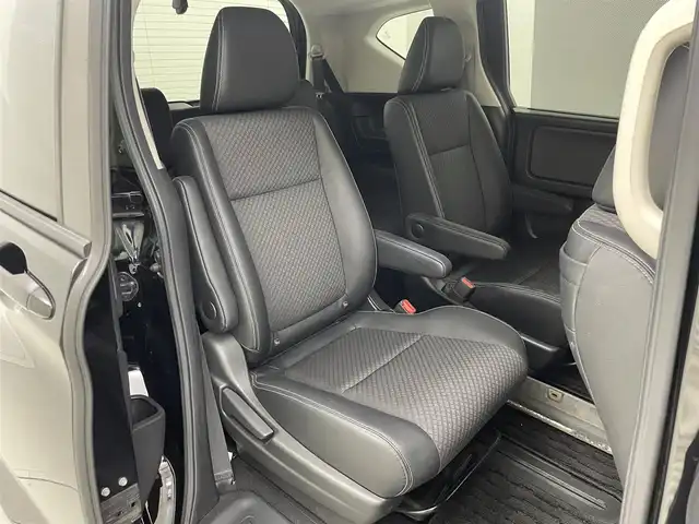 ホンダ フリード G ホンダセンシング 茨城県 2020(令2)年 7.7万km クリスタルブラックパール 純正ナビ/Bluetooth/フルセグ/radio/CD/DVD/バックカメラ/Honda SENSING/モデューロエアロ/レーダークルーズコントロール/Sパッケージ/・コンビシート/・本革巻ステアリングホイール/前後ドラレコ/前席シートヒーター/両側パワースライドドア/レーンキープアシスト/LEDヘッドライト/オートライト