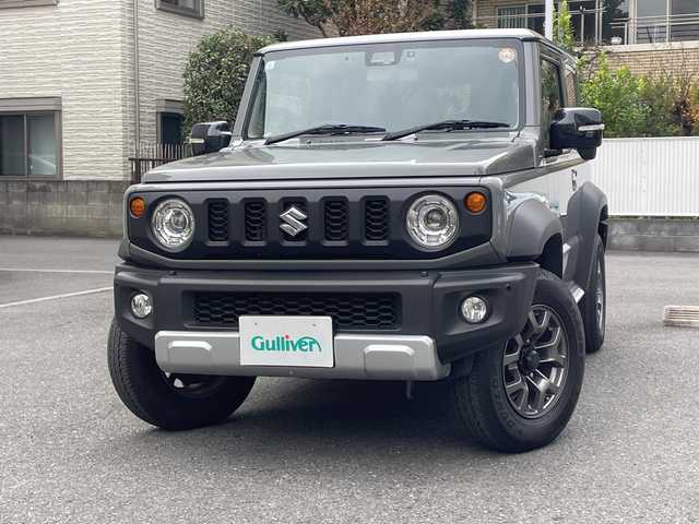 スズキ ジムニー シエラ JC 埼玉県 2023(令5)年 3.6万km ミディアムグレー 登録時35/161Km/ワンオーナー/フレックス4WD/純正メモリナビ(CN-HZ885)/フルセグ/CD/DVD/BT/SD/クルーズコントロール/バックカメラ/コーナーセンサー/レーンキープアシスト/ヒルディセントコントロール/衝突軽減システム/ドライブレコーダー(CA-DRZ3DXB)/シートヒーター/純正15インチアルミ/LEDヘッドライト/オートライト/電動格納ミラー/ウィンカーミラー/革巻きハンドル/ステアリングリモコン/ビルトインETC2.0/背面タイヤ/純正ラバーフロアマット/スマートキー/プッシュスタート/アイドリングストップ/保証書/取扱説明書/ナビ取扱説明書