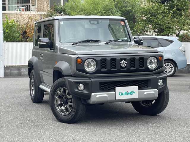 スズキ ジムニー シエラ JC 埼玉県 2023(令5)年 3.6万km ミディアムグレー 登録時35/161Km/ワンオーナー/フレックス4WD/純正メモリナビ(CN-HZ885)/フルセグ/CD/DVD/BT/SD/クルーズコントロール/バックカメラ/コーナーセンサー/レーンキープアシスト/ヒルディセントコントロール/衝突軽減システム/ドライブレコーダー(CA-DRZ3DXB)/シートヒーター/純正15インチアルミ/LEDヘッドライト/オートライト/電動格納ミラー/ウィンカーミラー/革巻きハンドル/ステアリングリモコン/ビルトインETC2.0/背面タイヤ/純正ラバーフロアマット/スマートキー/プッシュスタート/アイドリングストップ/保証書/取扱説明書/ナビ取扱説明書