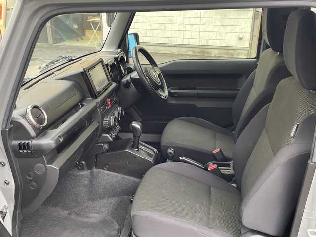 スズキ ジムニー シエラ JC 埼玉県 2023(令5)年 3.6万km ミディアムグレー 登録時35/161Km/ワンオーナー/フレックス4WD/純正メモリナビ(CN-HZ885)/フルセグ/CD/DVD/BT/SD/クルーズコントロール/バックカメラ/コーナーセンサー/レーンキープアシスト/ヒルディセントコントロール/衝突軽減システム/ドライブレコーダー(CA-DRZ3DXB)/シートヒーター/純正15インチアルミ/LEDヘッドライト/オートライト/電動格納ミラー/ウィンカーミラー/革巻きハンドル/ステアリングリモコン/ビルトインETC2.0/背面タイヤ/純正ラバーフロアマット/スマートキー/プッシュスタート/アイドリングストップ/保証書/取扱説明書/ナビ取扱説明書