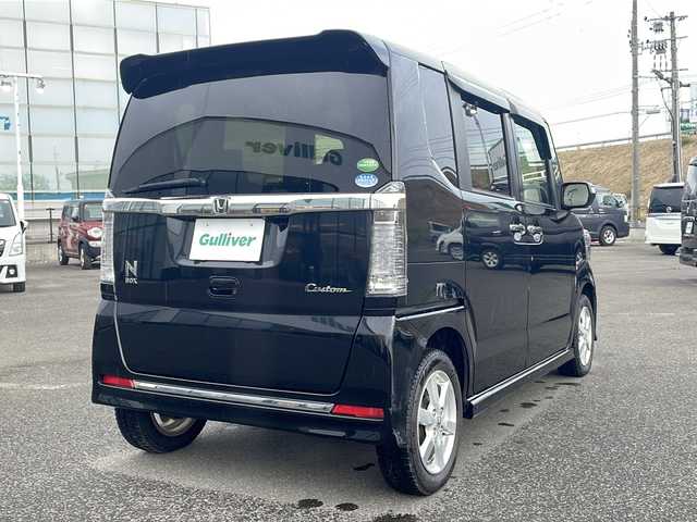 ホンダ Ｎ ＢＯＸ カスタム G ターボ Lパッケージ 青森県 2016(平28)年 4.2万km スマートブラック ・4WD/・純正フルセグナビTV/・CD・DVD・SD・Bluetooth/・クルーズコントロール/・横滑り抑制装置/・盗難防止装置/・パドルシフト/・前席シートヒーター/・両側パワースライドドア/・フルセグTV/・リア席サンシェード/・オートエアコン/・HIDヘッドライト/・LEDフォグランプ/・LEDポジションランプ/・純正15AW有/・純正フロアマット/・保証書/・取扱説明書