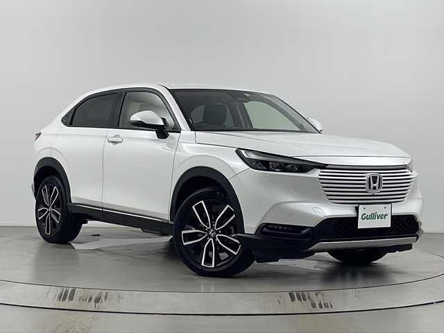 ホンダ ヴェゼル ハイブリッド e:HEV Z 埼玉県 2021(令3)年 3万km プラチナホワイトパール Ｈｏｎｄａ　ＳＥＮＳＩＮＧ　/純正ナビ/（FM/AM/BT/TV/USB/スマホ連携）/コーナーセンサー　/ブラインドスポットモニター　/ビルトインＥＴＣ２．０　/ワイヤレス充電器　/ヒーデットミラー　/前席シートヒーター　/ハーフレザーシート/ハンドルヒーター　/革巻きハンドル/全方位カメラ/電動リアゲート/ウインカーミラー/プッシュスタート/スマートキー×2