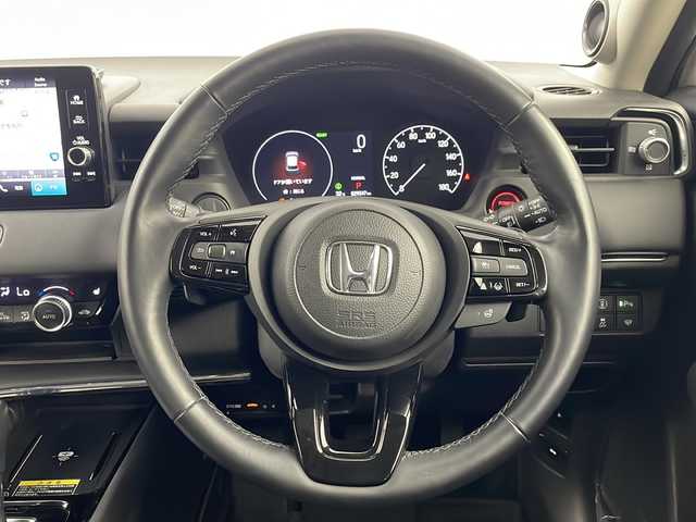 ホンダ ヴェゼル ハイブリッド e:HEV Z 埼玉県 2021(令3)年 3万km プラチナホワイトパール Ｈｏｎｄａ　ＳＥＮＳＩＮＧ　/純正ナビ/（FM/AM/BT/TV/USB/スマホ連携）/コーナーセンサー　/ブラインドスポットモニター　/ビルトインＥＴＣ２．０　/ワイヤレス充電器　/ヒーデットミラー　/前席シートヒーター　/ハーフレザーシート/ハンドルヒーター　/革巻きハンドル/全方位カメラ/電動リアゲート/ウインカーミラー/プッシュスタート/スマートキー×2