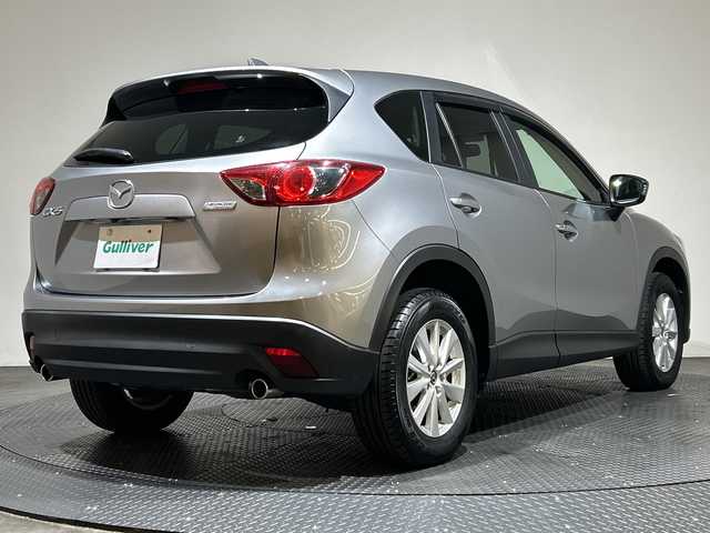 マツダ ＣＸ－５ XD 愛媛県 2012(平24)年 1.1万km アルミニウムメタリック 社外ナビ/フルセグ／Ｂｌｕｅｔｏｏｔｈ／ＵＳＢ/バックカメラ/前方ドライブレコーダー/アダクティブフロントライティングシステム/トラクションコントロールシステム/ステアリングスイッチ/フロントフォグランプ