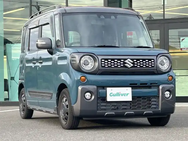 スズキ スペーシア ギア HYBRID XZ 鹿児島県 2021(令3)年 7万km デニムブルー ガンメタリック 2トーン 社外ナビ/ワンセグTV/Bluetoothオーディーオ/バックカメラ/両側パワースライドドア/衝突軽減システム/レーンアシスト/レーダークルーズコントロール/横滑り防止装置/スマートキー/プッシュスタート/ビルトインETC/フロントシートヒーター/スペアキー