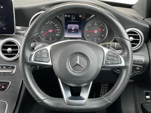 メルセデス・ベンツ Ｃ２２０ｄ ローレウスエディション 鹿児島県 2018(平30)年 5万km セレナイトグレー 純正HDDナビ/CD/DVD再生可/フルセグテレビ/バックカメラ/Bluetoothオーディオ/黒革シート/前席シートヒーター/前席パワーシート/アイドリングストップ/追従型クルーズコントロール/レーンキープアシスト/衝突軽減ブレーキ/前後ドライブレコーダー/プッシュスタート/純正フロアマット/2.0ETC/LEDヘッドライト/スマートキー/新車時保証書/取扱説明書/スペアキー1本