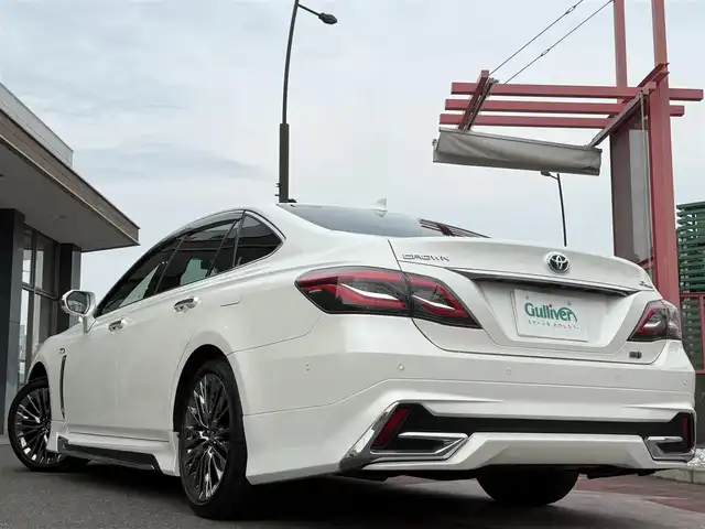トヨタ クラウン ハイブリッド G－エグゼクティブ 香川県 2019(平31)年 7万km ホワイトパールクリスタルシャイン メーカーナビ/フルセグ/CD/DVV/Bluetooth/パノラミックビューモニター/モデリスタエアロ/純正18インチアルミ/クリアランスソナー/LEDヘッドライト/デジタルインナーミラー/黒革シート/全席シートヒーター/全席パワーシート/前席シートベンチレーション/全ドアイージークローザー/パーキングアシスト/オートハイビーム/レーダークルーズ/レーンキープアシスト/ビルトインETC