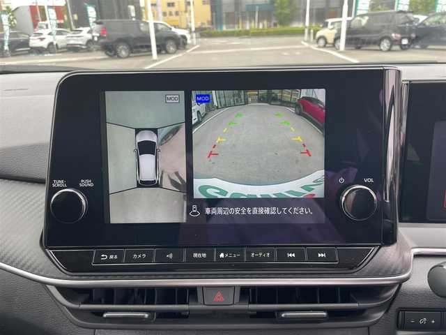 日産 ノート X 愛媛県 2023(令5)年 6.8万km 緑 プッシュスタート/純正ナビ（AM/FM/Bluetooth/フルセグTV）/アラウンドビューモニター/ETC２．０/横滑り防止装置/レーンキープアシスト/オートライト/オートマチックハイビーム/コーナーセンサー/クルーズコントロール