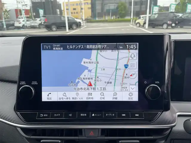 日産 ノート X 愛媛県 2023(令5)年 6.8万km 緑 プッシュスタート/純正ナビ（AM/FM/Bluetooth/フルセグTV）/アラウンドビューモニター/ETC２．０/横滑り防止装置/レーンキープアシスト/オートライト/オートマチックハイビーム/コーナーセンサー/クルーズコントロール