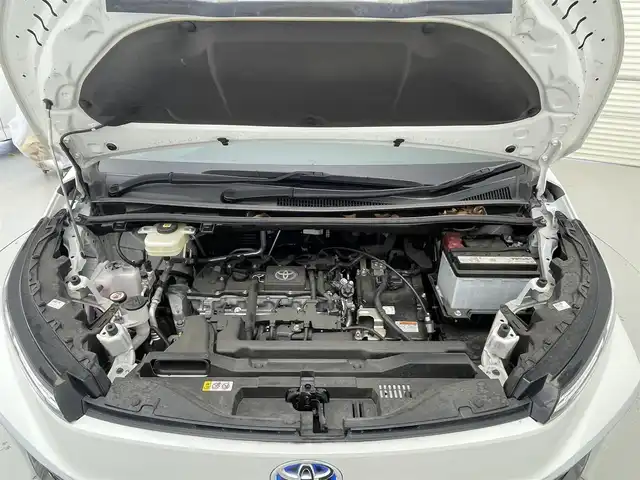 トヨタ ヴォクシー ハイブリッド S－Z 茨城県 2022(令4)年 2.3万km ホワイトパールクリスタルシャイン 快適利便パッケージ/純正10.5型DA/バックカメラ/フルセグ/CD/DVDデッキ/衝突被害軽減ブレーキ/車線逸脱抑制装置/レーダークルーズコントロール/オートマチックハイビーム/クリアランスソナー/BSM/両側電動スライドドア/ETC2.0/AC100V/パワーバックドア/シートヒーター/純正17インチAW/3眼LEDヘッドライト/スマートキー