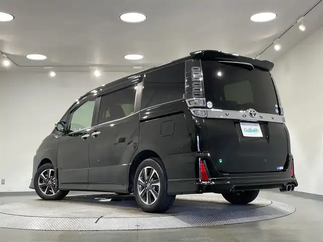 トヨタ ヴォクシー ZS 煌 愛知県 2018(平30)年 8万km イナズマスパーキングブラックガラスフレーク 純正１０．５インチナビ/（AF/FM/CD/DVD/フルセグTV/SD/Bluetooth）　/モデリスタフルエアロ/トヨタセーフティセンス/　ー衝突軽減システム/　－レーンキープアシスト/　－オートマチックハイビーム/　－クルーズコントロール/　－先行車発進告知/両側電動スライドドア　/ビルトインＥＴＣ　/ＬＥＤヘッドライト　/バックカメラ　/ドライブレコーダー　/プッシュスタート/スマートストップ/スマートキー/純正フロアマット/純正アルミホイール