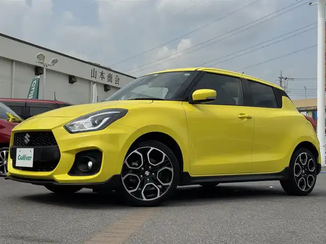 スズキ スイフト スポーツ セーフティPKG 千葉県 2018(平30)年 4万km チャンピオンイエロー ワンオーナー/6速MT/セーフティパッケージ/デュアルセンサーブレーキサポート/誤発信抑制機能/車線逸脱抑制機能/ふらつき警報/先行者発進お知らせ機能/レーダークルーズコントロール/純正8型ナビ/フルセグTV/Bluetooth/ビルトインETC/スポーツ専用バケットシート/シートヒーター/純正フロアマット/カーボンエアロ/純正17インチAW/オートライト
