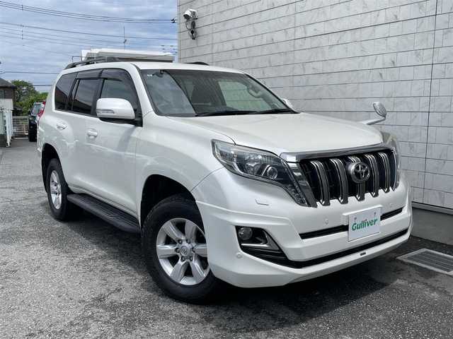 トヨタ ランドクルーザー プラド TX 埼玉県 2015(平27)年 5.8万km ホワイトパールクリスタルシャイン 外部検査済み/中期型/ディーゼルターボ/OPモデリスタエアロ/OPモデリスタマフター/OPメーカーナビゲーション/OPルーフレール/センターデフロック/ダウンヒルアシスト/LEDヘッドライト/サイドステップ/フロアマット/ドアバイザー/ドライブレコーダー/ETC