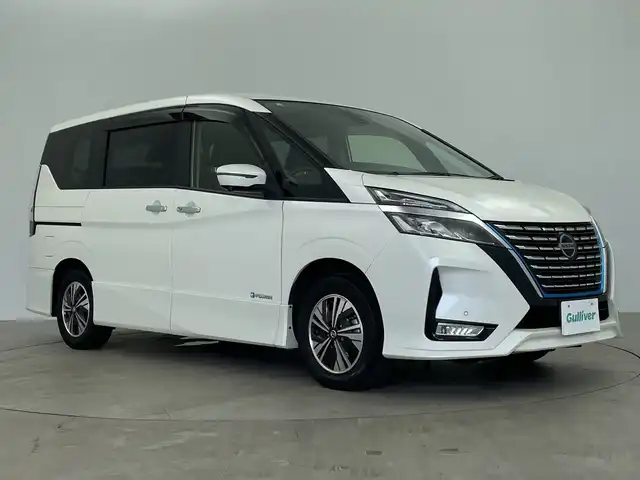 日産 セレナ e－パワー ハイウェイスター V 鹿児島県 2021(令3)年 4.4万km ブリリアントホワイトパール 純正ナビ/（AM/FM/CD/DVD/Bluetooth)/フルセグTV/アラウンドビューモニター/フリップダウンモニター/プロパイロット/両側パワースライドドア/ハンズフリーオートスライド/前席シートヒーター/ステアリングヒーター/ステアリングリモコン/横滑り防止/衝突被害軽減ブレーキ/クルーズコントロール/レーンキープアシスト/オートライト/前後コーナーセンサー/LEDヘッドライト/フォグランプ/フロアマット/純正15インチアルミ/プッシュスタート
