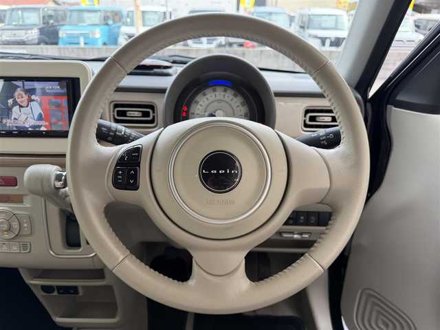 スズキ ラパン X 兵庫県 2021(令3)年 5.6万km アーバンブラウンパールメタリック 社外ナビ(AVN-R10)/(CD/BT/SD)/フルセグTV/バックカメラ/ETC/衝突軽減ブレーキ/コーナーセンサー/前後ドライブレコーダー/前席シートヒーター/HIDヘッドライト/オートライト/ステアリングリモコン/革巻ステアリング/スマートキー/電動格納ミラー/ドアバイザー/社外フロアマット