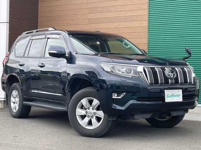 トヨタ ランドクルーザー プラド TX 静岡県 2021(令3)年 4.8万km ブラッキッシュアゲハガラスフレーク ４WD/ワンオーナー/純正SDナビ【AM/FM/BT/CD/DVD】/フルセグＴＶ/バックカメラ/ステアリングスィッチ/ＥＴＣ/スマートキー/クルーズコントロール/ルーフレール/コーナーセンサー/純正フロアマット/プッシュスタート/オートマチックハイビーム/オートライト/電格ミラー/スペアキー１/レーンキープアシスト/衝突被害軽減システム/ステアリングリモコン/横滑り防止装置/ドライブレコーダー/保証書/取扱説明書