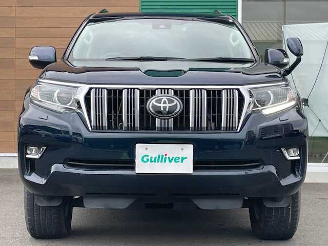 トヨタ ランドクルーザー プラド TX 静岡県 2021(令3)年 4.8万km ブラッキッシュアゲハガラスフレーク ４WD/ワンオーナー/純正SDナビ【AM/FM/BT/CD/DVD】/フルセグＴＶ/バックカメラ/ステアリングスィッチ/ＥＴＣ/スマートキー/クルーズコントロール/ルーフレール/コーナーセンサー/純正フロアマット/プッシュスタート/オートマチックハイビーム/オートライト/電格ミラー/スペアキー１/レーンキープアシスト/衝突被害軽減システム/ステアリングリモコン/横滑り防止装置/ドライブレコーダー/保証書/取扱説明書