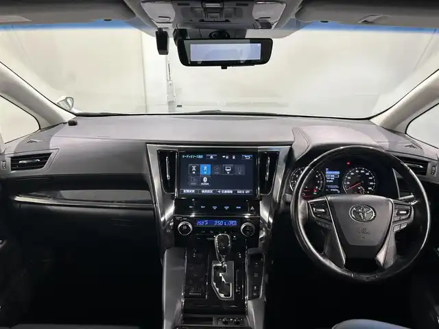 トヨタ ヴェルファイア Z Gエディション 愛知県 2018(平30)年 4.2万km ホワイトパールクリスタルシャイン 純正１０型Ｔコネクトナビ/(AM/FM/CD・DVD再生/フルセグTV/SD/Bluetooth)/バックカメラ/ツインムーンルーフ　/ＡＣ１００Ｖコンセント　/純正フリップダウンモニター　/デジタルインナーミラー　/ビルトインＥＴＣ２．０　/トヨタセーフティセンス　/　　-プリクラッシュセーフティ/　　-レーントレーニングアシスト（LTA)/　　-レーダークルーズコントロール（ACC)/　　-ロードサインアシスト（RSA)/　　-アダプティブハイビームシステム/両側パワースライドドア　/電動リアゲード　/シートヒーター/エアシート/オートブレーキホールド機能/クリアランスソナー