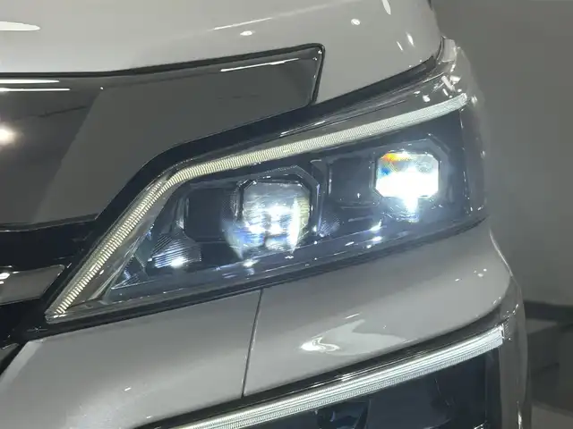トヨタ ヴェルファイア Z Gエディション 愛知県 2018(平30)年 4.2万km ホワイトパールクリスタルシャイン 純正１０型Ｔコネクトナビ/(AM/FM/CD・DVD再生/フルセグTV/SD/Bluetooth)/バックカメラ/ツインムーンルーフ　/ＡＣ１００Ｖコンセント　/純正フリップダウンモニター　/デジタルインナーミラー　/ビルトインＥＴＣ２．０　/トヨタセーフティセンス　/　　-プリクラッシュセーフティ/　　-レーントレーニングアシスト（LTA)/　　-レーダークルーズコントロール（ACC)/　　-ロードサインアシスト（RSA)/　　-アダプティブハイビームシステム/両側パワースライドドア　/電動リアゲード　/シートヒーター/エアシート/オートブレーキホールド機能/クリアランスソナー