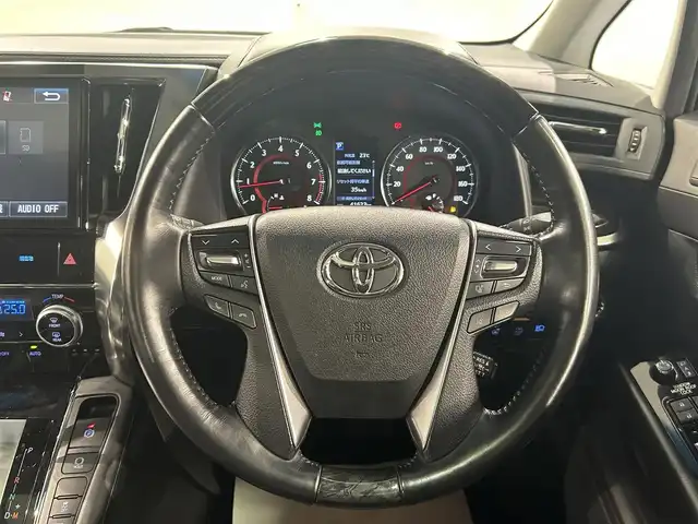 トヨタ ヴェルファイア Z Gエディション 愛知県 2018(平30)年 4.2万km ホワイトパールクリスタルシャイン 純正１０型Ｔコネクトナビ/(AM/FM/CD・DVD再生/フルセグTV/SD/Bluetooth)/バックカメラ/ツインムーンルーフ　/ＡＣ１００Ｖコンセント　/純正フリップダウンモニター　/デジタルインナーミラー　/ビルトインＥＴＣ２．０　/トヨタセーフティセンス　/　　-プリクラッシュセーフティ/　　-レーントレーニングアシスト（LTA)/　　-レーダークルーズコントロール（ACC)/　　-ロードサインアシスト（RSA)/　　-アダプティブハイビームシステム/両側パワースライドドア　/電動リアゲード　/シートヒーター/エアシート/オートブレーキホールド機能/クリアランスソナー