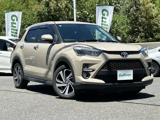 トヨタ ライズ Z 長崎県 2021(令3)年 6.8万km ナチュラルベージュマイカM ワンオーナー/純正9インチディスプレイオーディオ(BT/ラジオ/TV/Apple　Carplay/Android　Auto)/プッシュスタート/スマートキー/スペアキー/MTモード付AT/全車速追従機能付ACC/前後ドラレコ/ビルトインETC/デジタルインナーミラー/純正フロアマット/ドアバイザー/純正17インチアルミホイール/前席シートヒーター/ABS/VSC・TRC/イモビライザーシステム/スマートアシスト/前後コーナーセンサー/アイドリングストップ/LKC/SRSダブル・サイドエアバッグ/SRSカーテンエアバッグ/オートライト/取扱説明書/保証書/記録簿