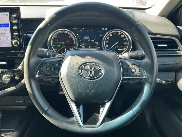 トヨタ カムリ WSレザーパッケージ 愛知県 2023(令5)年 0.8万km アティチュードブラックマイカ/プラチナホワイトパールマイカ /禁煙車/ワンオーナー//9インチディスプレイオーディオ//Tコネクトナビ/フルセグTV//Bluetooth・USB//バックカメラ・パノラミックビューモニター//ビルトインETC2.0//前後ドライブレコーダー//カラーヘッドアップディスプレイ//トヨタセーフティセンス//プリクラッシュセーフティ//レーントレーシングアシスト//オートマチックハイビーム//ロードサインアシスト//レーダークルーズコントロール/　（全車速追従機能付き）//ブラインドスポットモニター//クリアランスソナー//リアクロストラフィックアラート//パーキングサポートブレーキ//黒本革シート//前席シートヒーター//前席パワーシート//パドルシフト//純正１８インチアルミ//本革巻きステアリング//電動チルトステアリング//電動パーキング・ブレーキホールド//ISOFIX//LEDオートライト//電動格納ミラーウィンカー//純正フロアマット//純正ドアバイザー//取扱説明書//新車保証書//スペアキー