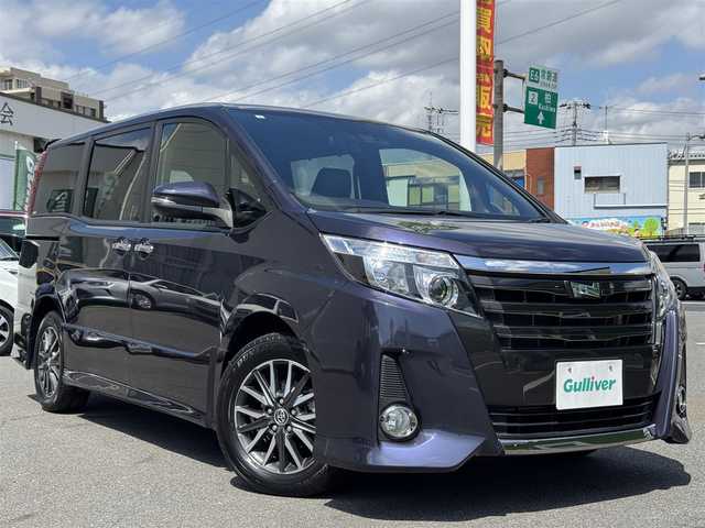 トヨタ ノア Si ダブルバイビー 千葉県 2017(平29)年 2.6万km ダークバイオレットマイカメタリック ワンオーナー/プリクラッシュセーフティ/レーンキープアシスト/クルーズコントロール/純正9インチナビ/バックカメラ/AM/FM/CD/DVD/BT/フルセグTV/TVキャンセラー切替スイッチ付/ビルトインETC/両側パワースライドドア/ハーフレザーシート/2列目ロールサンシェード/ハーフレザーシート/アイドリングストップ/オートマチックハイビーム/オールオートパワーウィンドウ/純正フロアマット/純正ラゲージパーテーションケース/純正16インチAW/LEDヘッドライト/スペアキー1本/保証書・取説/H29・30・R1~6記録簿
