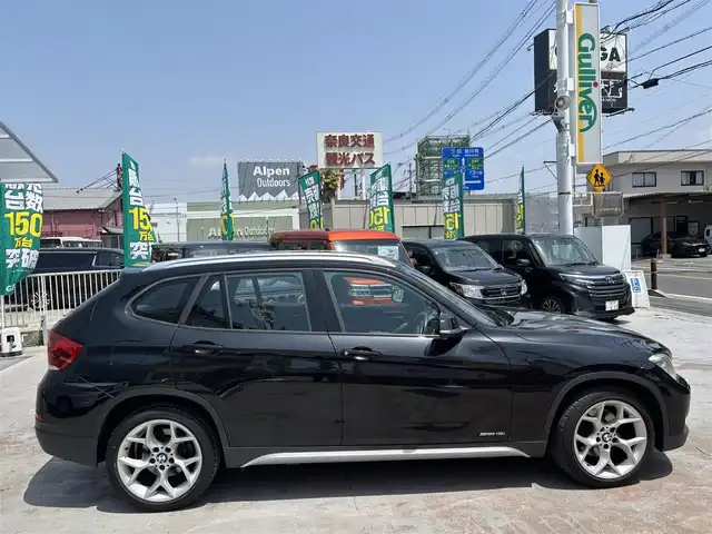 ＢＭＷ Ｘ１ sDrive 18i 京都府 2014(平26)年 7.7万km サファイアブラックP 禁煙車/ETC/AUX/ハーフレザー/キセノン/スマートキー２個/１８インチアルミホイール/保証書/